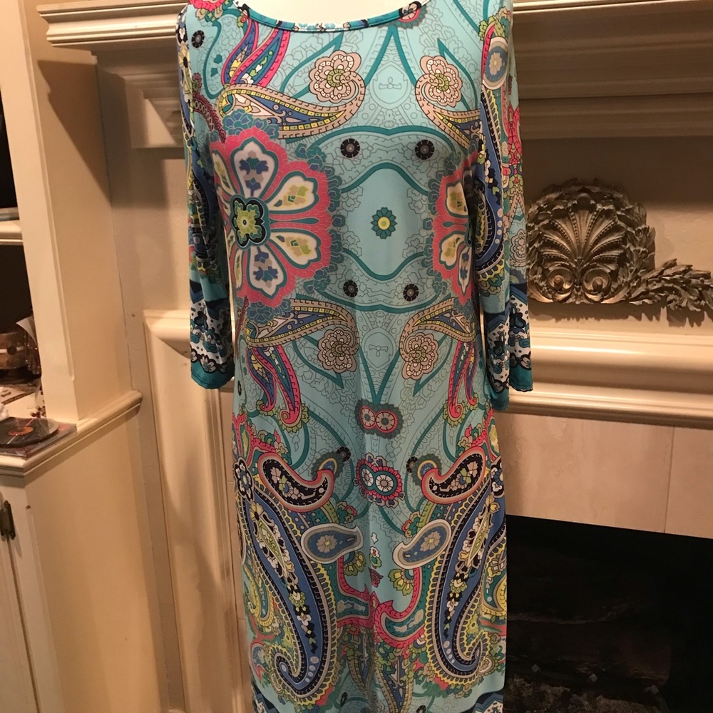 Print dress with great colors. Flexible sizing will fit small thru large.